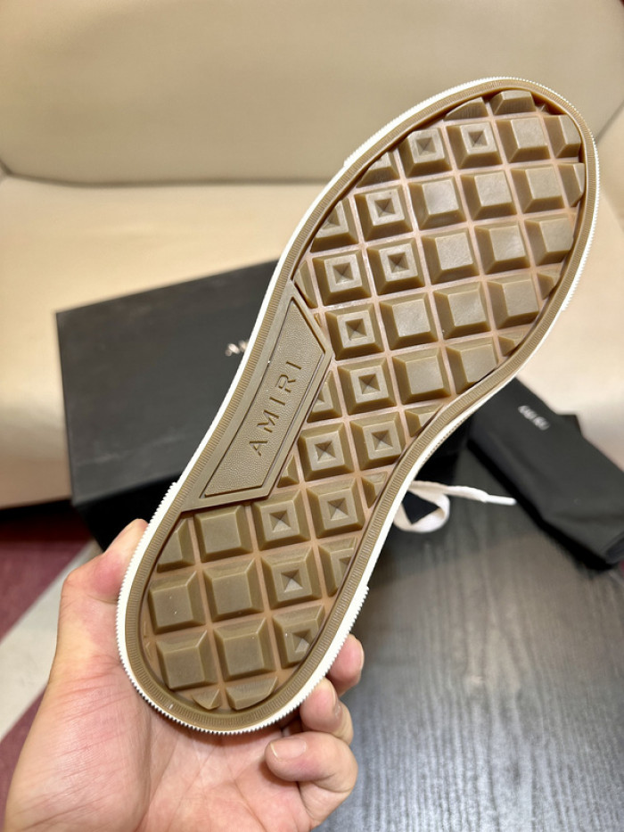 amiri* appliquéd leather and canvas sneakers