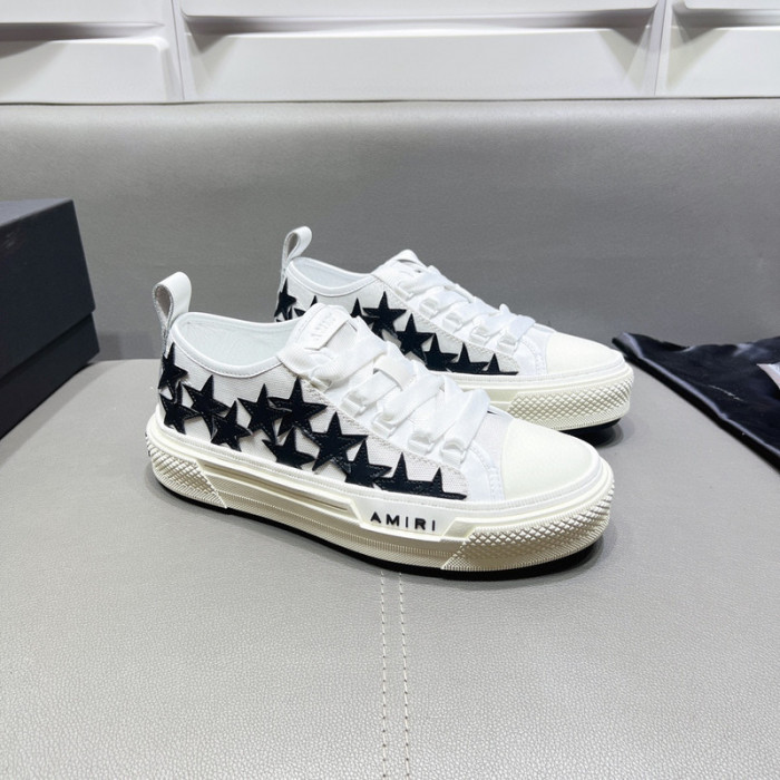 amiri* appliquéd leather and canvas sneakers