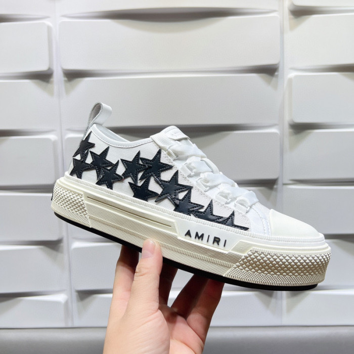 amiri* appliquéd leather and canvas sneakers